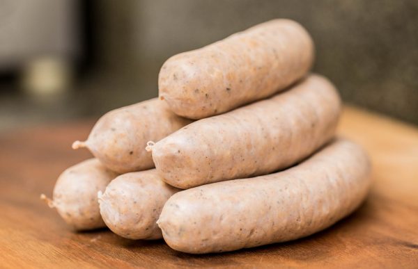 Otto's Sausages on cuttingboard