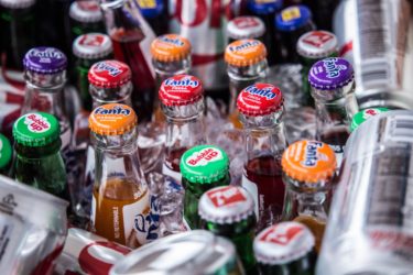 soda bottles on ice