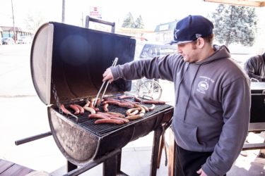 Man grilling at Otto&#039;s Sausage Kitchen